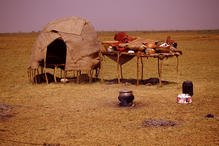 A Fulani household consists of a tent shelter for sleeping, a storage platform and an outdoor courtyard in which most of the domestic work activities take place. 